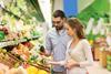 Generic couple buying avocados